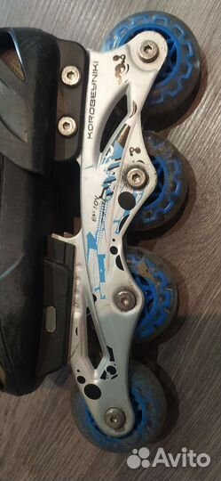 Роликовые коньки