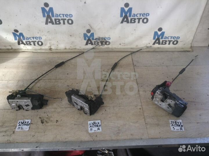 Замок двери передний Опель Астра Н