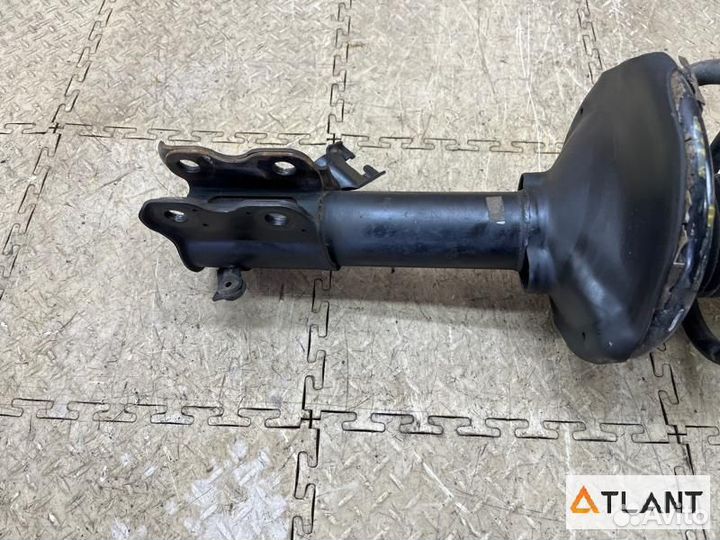 Стойка передняя левая nissan liberty