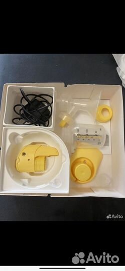 Молокоотсос medela электрический