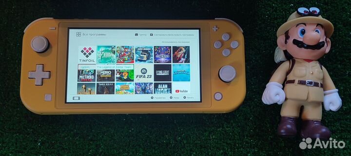 Прошитый Nintendo Switch Lite и много игр в Марио