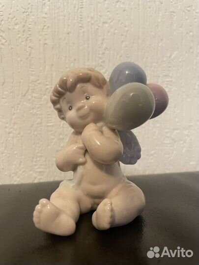 Фарфоровая статуэтка Pavone