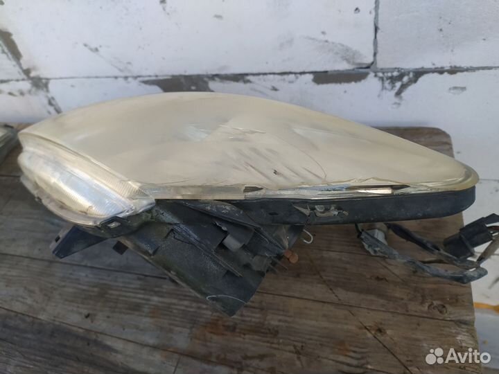 Передние фары Митсубиси Лансер 9