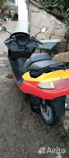 Макси скутер