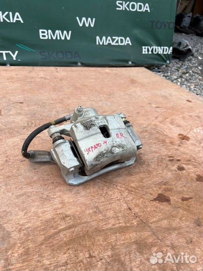 Суппорт тормозной передний правый Kia Cerato 4