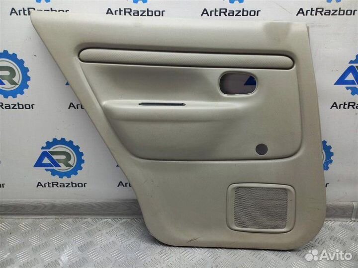 Обшивка двери задней левой Mazda Demio 1 DW3W 1.3