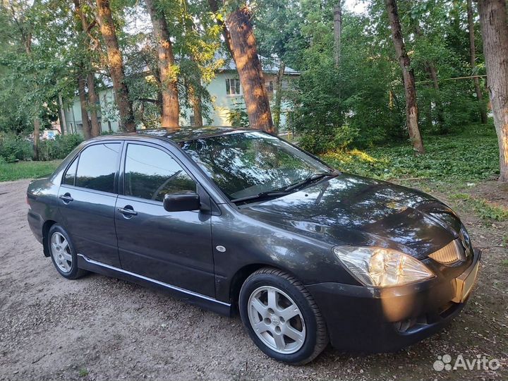 Mitsubishi Lancer 1.6 AT, 2004, 220 300 км