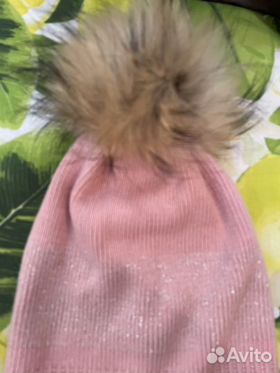 Шапки с мехом енота