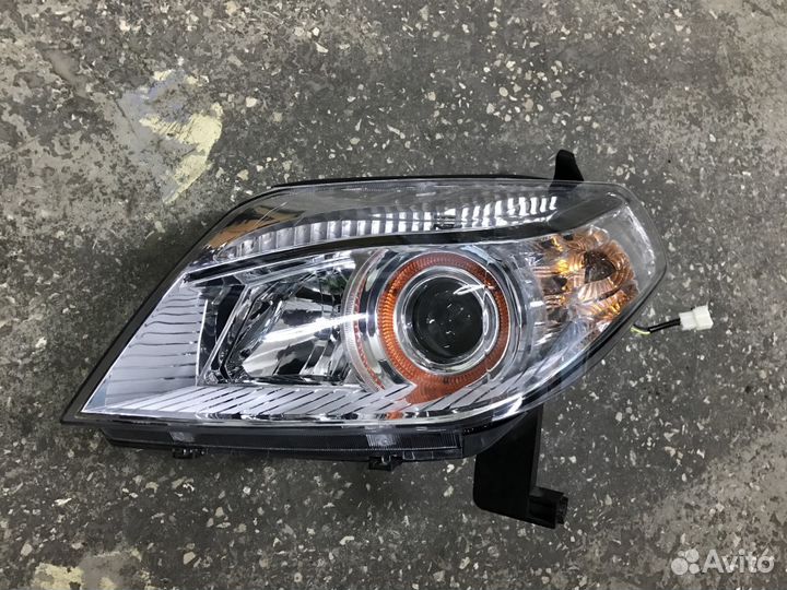 Фара левая новая Geely MK Cross