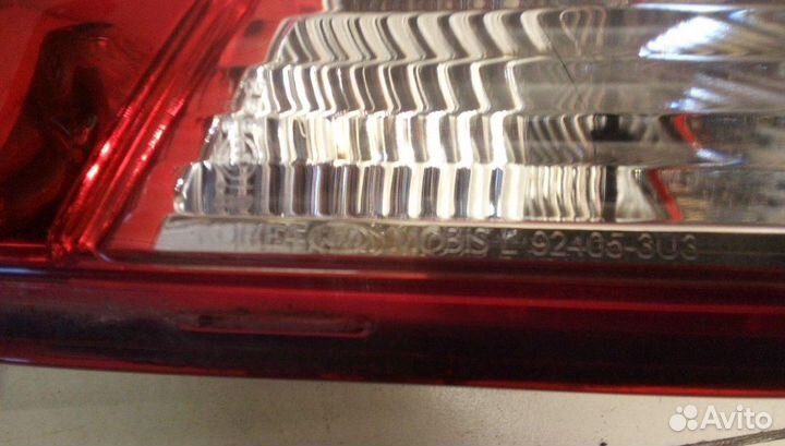 Фонарь задний левый в бампер Kia Sportage