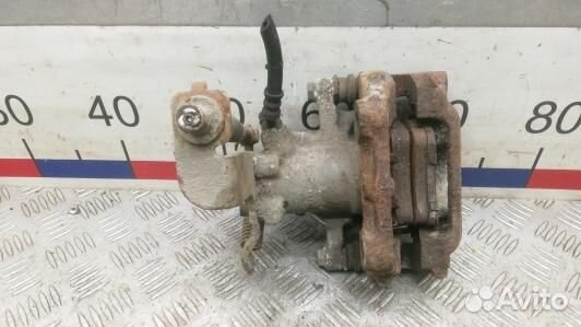 Суппорт тормозной задний левый toyota avensis T27