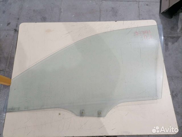 Переднее левое стекло двери Mazda 323 BA