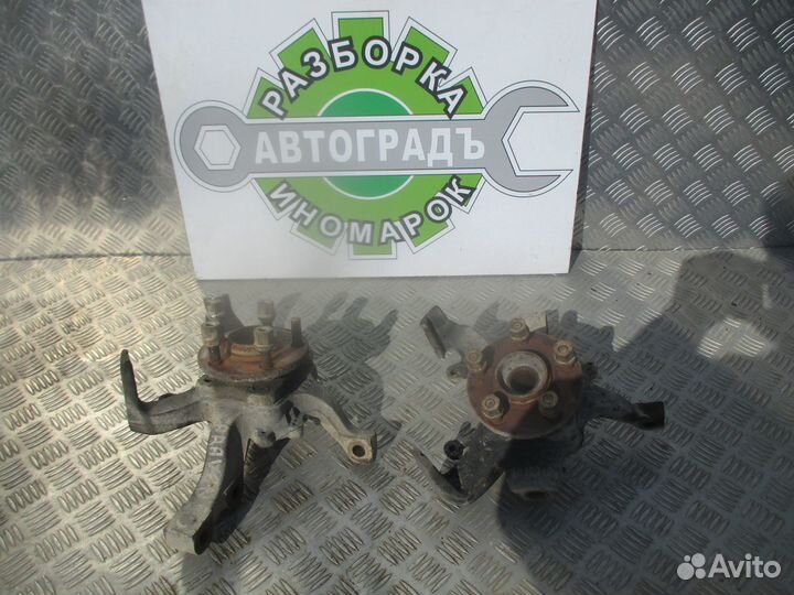 Кулак поворотный передний Dodge Caravan 3