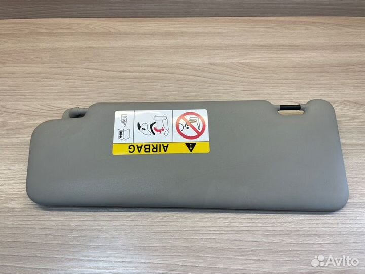 Козырек солнцезащитный правый Renault Logan