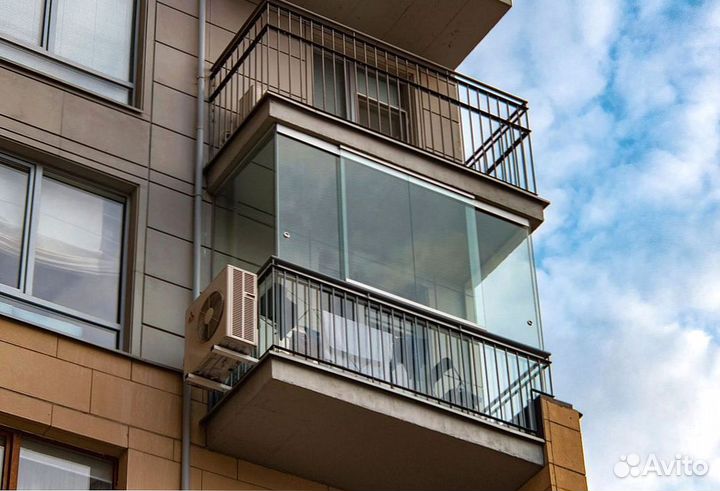 Безрамное раздвижное остекление