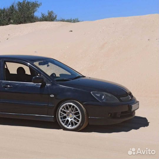 Юбка переднего бампера 2.0 Митцубиси Лансер 9