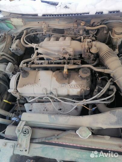 Двигатель mazda323