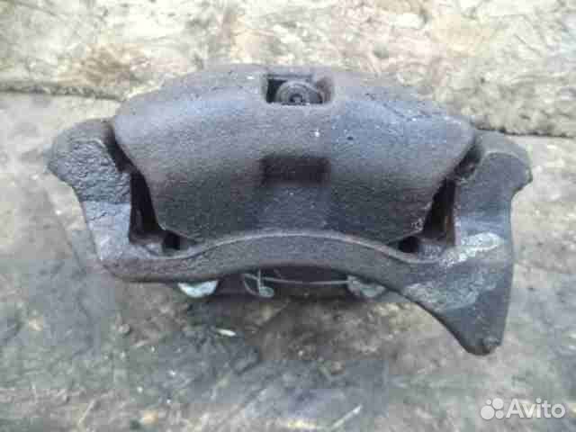 Суппорт передний левый Renault Sandero 1