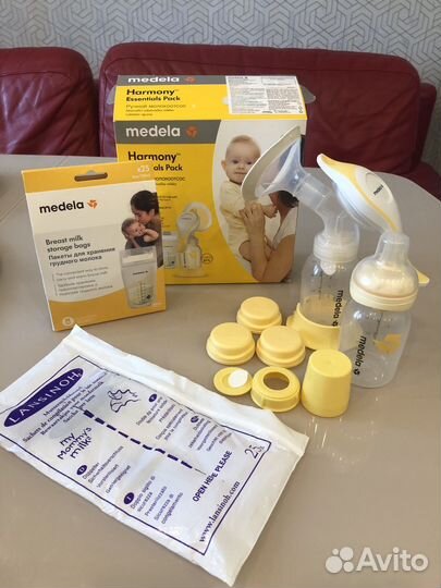 Молокоотсос ручной medela+ пакеты+бутылочка