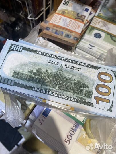 Вакуумная упаковка долларов нового образца