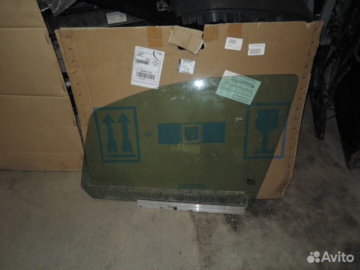 Стекло двери передней левой Opel Zafira В