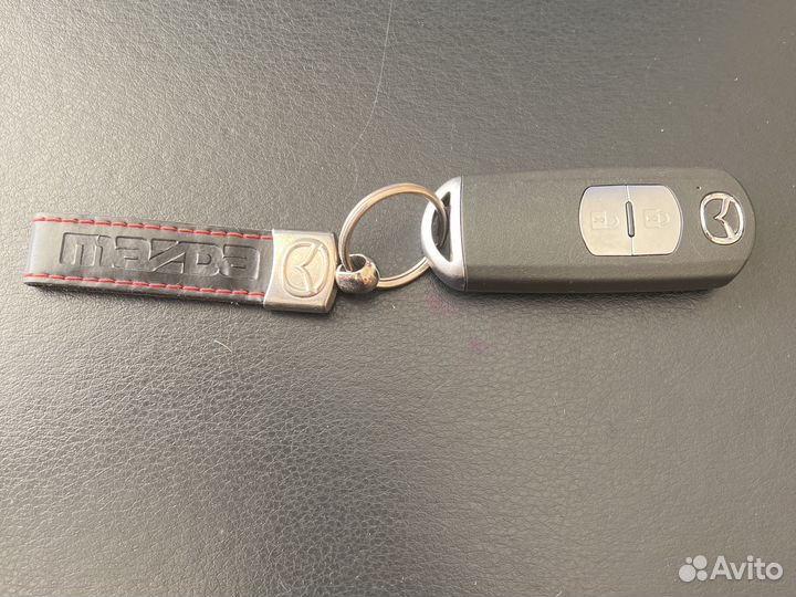 Ключ зажигания Mazda 2012 года