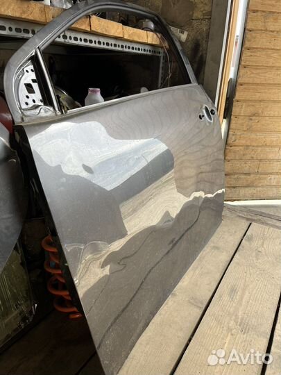 Двери левые Toyota Corolla e150