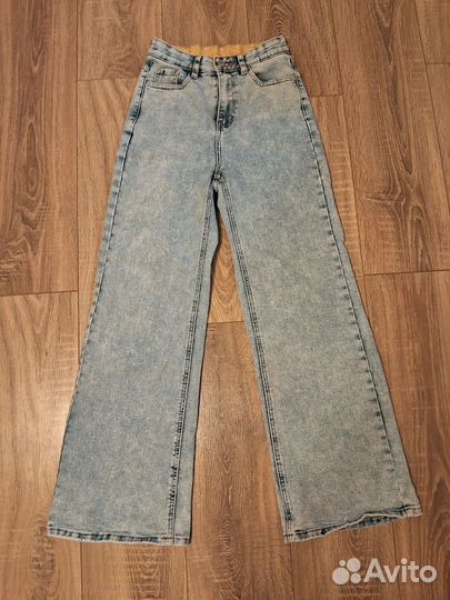 Джинсы клеш женские