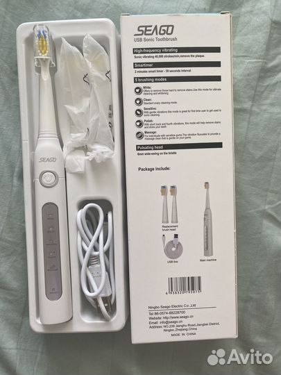 Электрическая зубная щетка