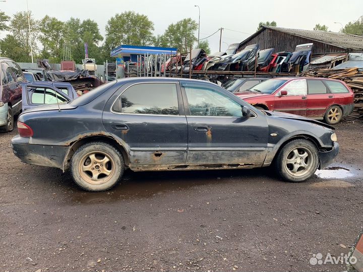 В разборе Kia Clarus