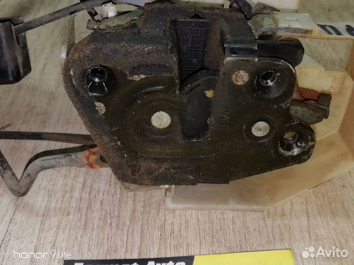 Замок двери передний левый Hyundai Sonata EF