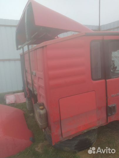 Кабина ман тга