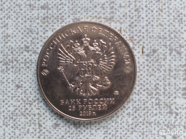 Монета бременские музыканты