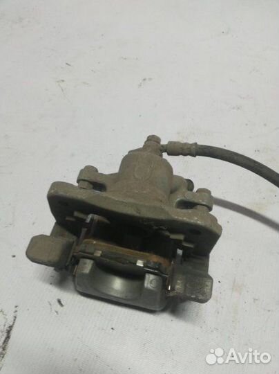 Суппорт задний левый Toyota Camry V50 2.5