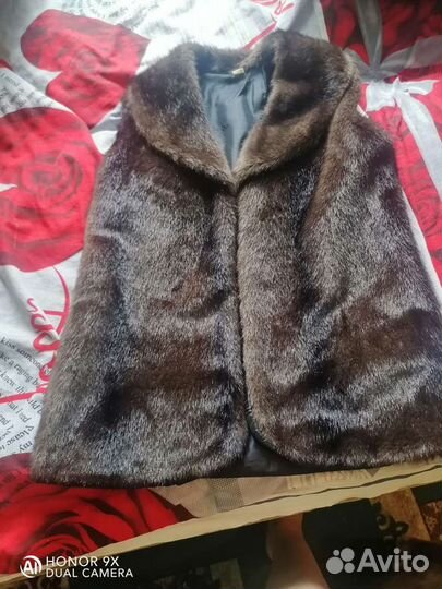 Жилетка меховая женская