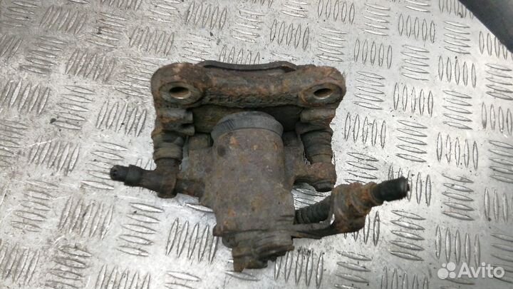 Суппорт задний левый Volkswagen Sharan рест. 2002