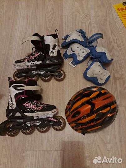 Роликовые коньки