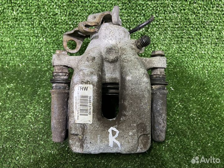 Суппорт тормозной задний правый Peugeot 308