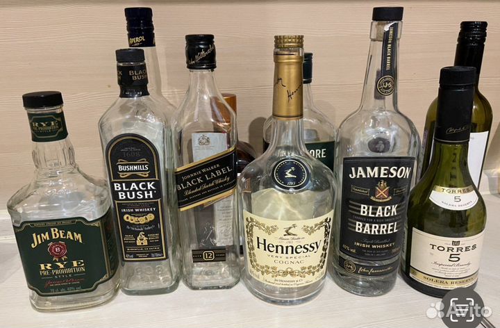 Бутылка стеклянная от элитного алкоголя