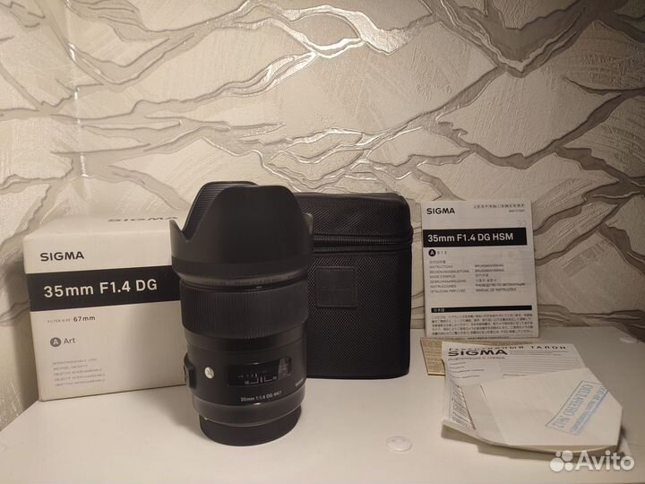 Объектив Sigma 35mm f/1.4 ART Canon Комплект