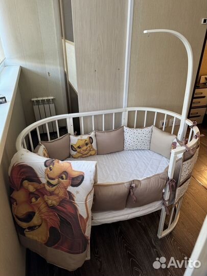 Детская кроватка трансформер с маятником