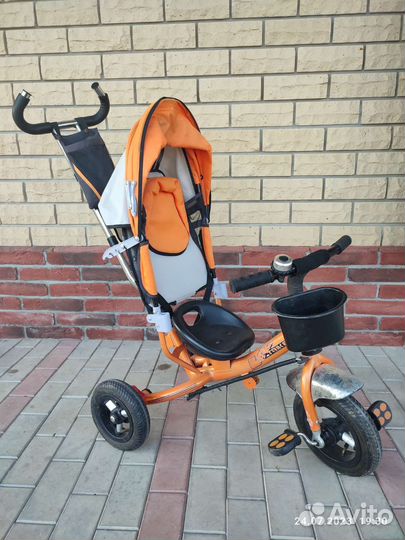 Трехколесный велосипед с ручкой