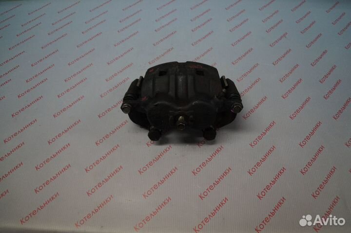 Nissan 41001-4N000 Суппорт тормозной передний R