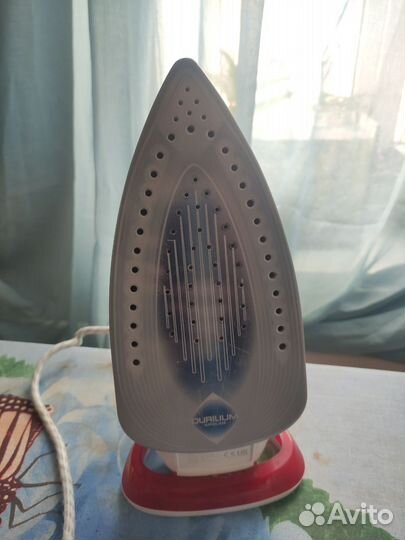 Гладильная доска и утюг