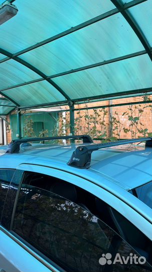 Поперечины turtle air 3 на Oпель астра h