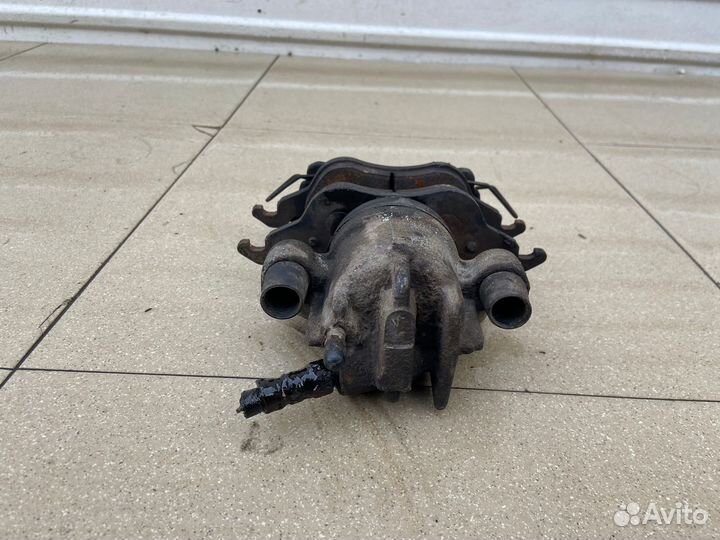 Тормозной суппорт передний правый Ford Focus 1