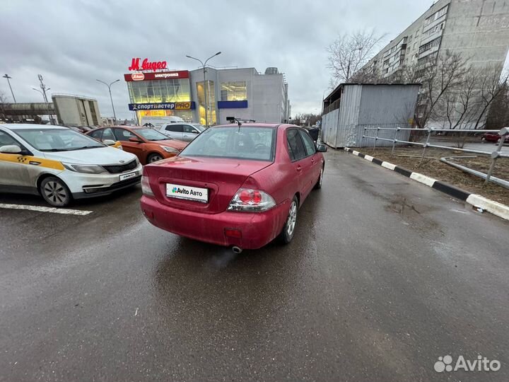 Mitsubishi Lancer 1.6 AT, 2005, 310 000 км