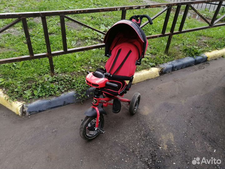 Детский трехколесный велосипед коляска