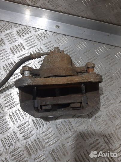 Суппорт передний левый Kia Rio JB