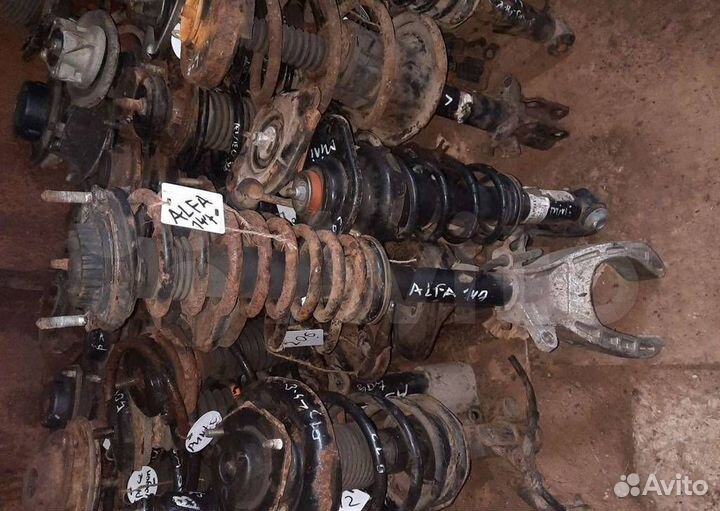 Стойка амортизатора передняя левая Alfa Romeo 147